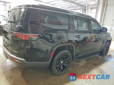 Trzecie zdjęcie samochodu z tyłu: 2022 JEEP WAGONEER SERIES I VIN:1C4SJVAT8NS206531 - miniatura