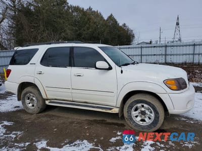 Czwarte zdjęcie samochodu z boku: 2002 TOYOTA SEQUOIA LIMITED VIN:5TDBT48A82S057907 - miniatura