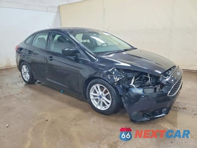 Czwarte zdjęcie samochodu z boku: 2018 FORD FOCUS SE VIN:1FADP3F21JL206201 - miniatura