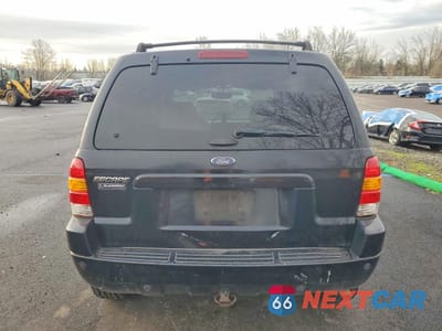 Zdjęcie 6 z 13 samochodu: 2003 FORD ESCAPE 4D S VIN:1FMCU94183KD38937 - miniatura