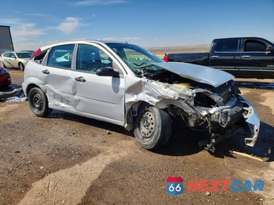 Czwarte zdjęcie samochodu z boku: 2007 FORD FOCUS ZX5 VIN:1FAHP37NX7W216520 - miniatura