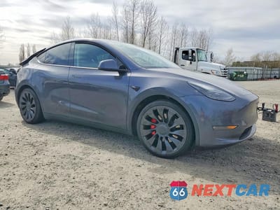 Czwarte zdjęcie samochodu z boku: 2022 TESLA MODEL Y VIN:7SAYGDEF4NF559713 - miniatura