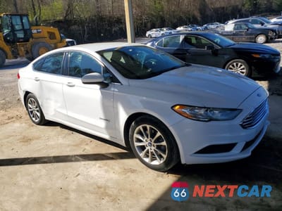 Czwarte zdjęcie samochodu z boku: 2017 FORD FUSION SE HYBRID VIN:3FA6P0LU5HR358670 - miniatura