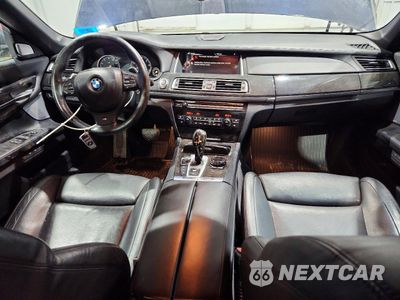 Zdjęcie 8 z 13 samochodu: 2015 BMW 750 LXI VIN:WBAYF8C50FD654860 - miniatura