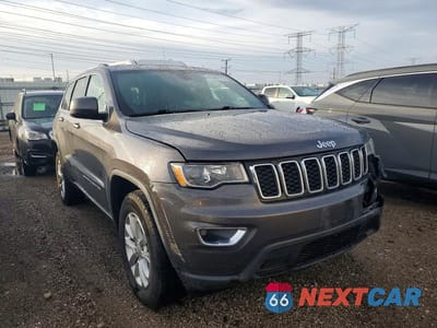 Czwarte zdjęcie samochodu z boku: 2021 JEEP GRAND CHEROKEE LAREDO VIN:1C4RJFAG4MC731912 - miniatura
