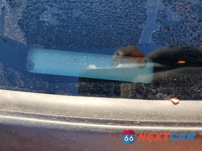 Zdjęcie 12 z 13 samochodu: 2001 FORD FOCUS SE VIN:1FAFP36351W269138 - miniatura