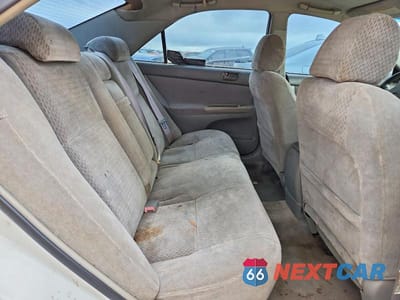 Zdjęcie 10 z 12 samochodu: 2002 TOYOTA CAMRY VIN:4T1BF32K72U019546 - miniatura