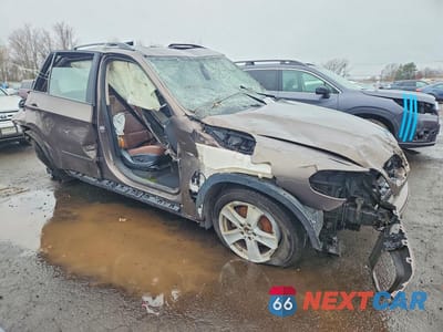 Czwarte zdjęcie samochodu z boku: 2013 BMW X5 XDRIVE35I VIN:5UXZV4C58D0B14262 - miniatura