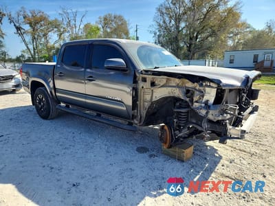 Czwarte zdjęcie samochodu z boku: 2018 TOYOTA TACOMA SR5 V6 VIN:3TMAZ5CN3JM055748 - miniatura