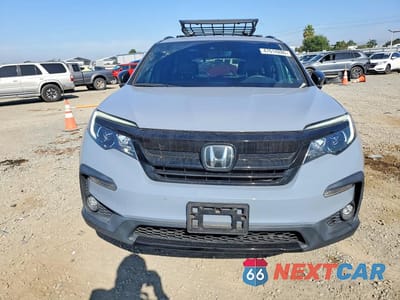 Piąte zdjęcie samochodu w środku: 2022 HONDA PILOT TRAILSPORT VIN:5FNYF6H8XNB021378 - miniatura