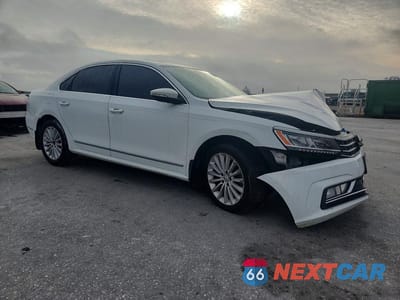 Czwarte zdjęcie samochodu z boku: 2016 VOLKSWAGEN PASSAT SE VIN:1VWBT7A30GC067415 - miniatura