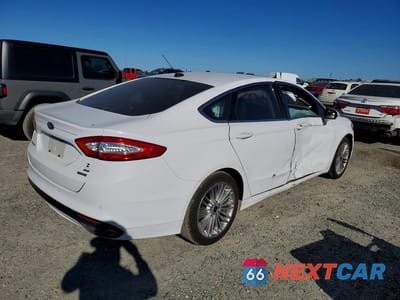 Trzecie zdjęcie samochodu z tyłu: 2016 FORD FUSION SE VIN:3FA6P0H96GR202317 - miniatura