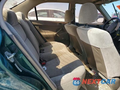 Zdjęcie 10 z 11 samochodu: 2000 HONDA CIVIC VIN:2HGEJ6612YH504905 - miniatura