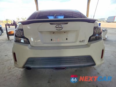 Zdjęcie 6 z 13 samochodu: 2014 SCION TC BASE VIN:JTKJF5C75E3082704 - miniatura
