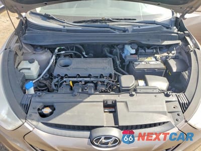 Zdjęcie 12 z 12 samochodu: 2012 HYUNDAI TUCSON GLS VIN:KM8JUCAC2CU372516 - miniatura