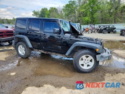 Czwarte zdjęcie samochodu z boku: 2013 JEEP WRANGLER UNLIMITED SPORT VIN:1C4BJWDG9DL545196 - miniatura