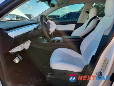 Zdjęcie 7 z 13 samochodu: 2022 TESLA MODEL Y VIN:7SAYGDEF7NF414908 - miniatura