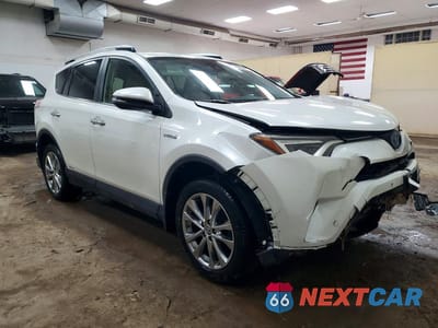 Czwarte zdjęcie samochodu z boku: 2016 TOYOTA RAV4 HYBRID LIMITED VIN:JTMDJREV4GD022299 - miniatura