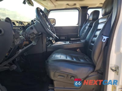 Zdjęcie 7 z 13 samochodu: 2006 HUMMER H2 VIN:5GRGN23U46H107619 - miniatura