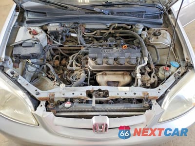 Zdjęcie 11 z 13 samochodu: 2002 HONDA CIVIC LX VIN:1HGEM21592L808009 - miniatura