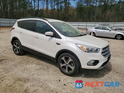 Czwarte zdjęcie samochodu z boku: 2018 FORD ESCAPE SEL VIN:1FMCU0HD0JUA03611 - miniatura