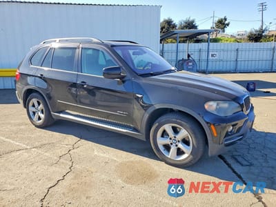 Czwarte zdjęcie samochodu z boku: 2009 BMW X5 VIN:5UXFE43579L263039 - miniatura