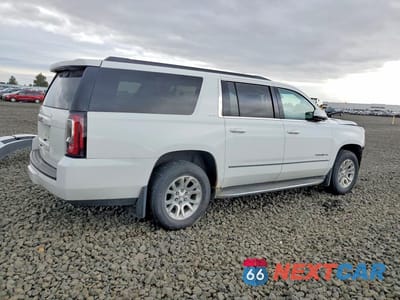 Trzecie zdjęcie samochodu z tyłu: 2015 GMC YUKON XL K1500 SLT VIN:1GKS2HKC9FR177423 - miniatura