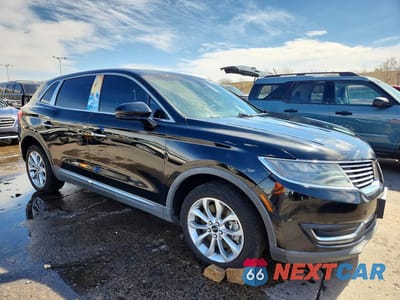 Czwarte zdjęcie samochodu z boku: 2016 LINCOLN MKX RESERVE VIN:2LMTJ8LP1GBL42471 - miniatura