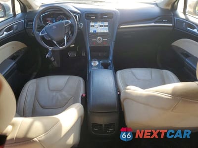 Zdjęcie 8 z 11 samochodu: 2018 FORD FUSION TITANIUM VIN:3FA6P0D92JR168289 - miniatura