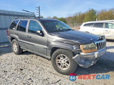 Czwarte zdjęcie samochodu z boku: 2003 JEEP GRAND CHEROKEE LAREDO VIN:1J8GX48S83C598146 - miniatura