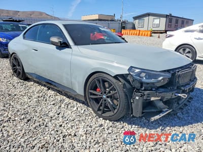 Czwarte zdjęcie samochodu z boku: 2022 BMW M240XI VIN:3MW53CM03N8C77230 - miniatura