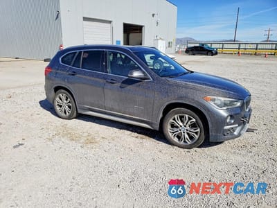 Czwarte zdjęcie samochodu z boku: 2017 BMW X1 XDRIVE28I VIN:WBXHT3Z39H4A56814 - miniatura