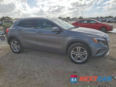 Czwarte zdjęcie samochodu z boku: 2015 MERCEDES-BENZ GLA 250 4MATIC VIN:WDCTG4GB1FJ031245 - miniatura