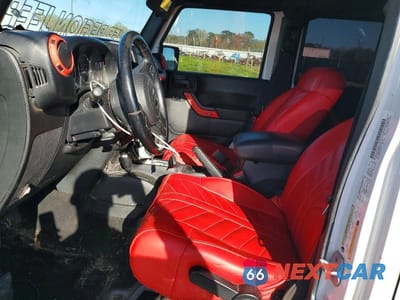 Zdjęcie 7 z 12 samochodu: 2012 JEEP WRANGLER UNLIMITED SAHARA VIN:1C4BJWEG6CL205775 - miniatura
