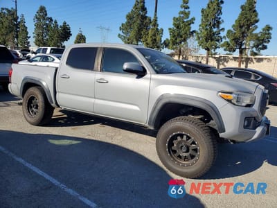 Czwarte zdjęcie samochodu z boku: 2019 TOYOTA TACOMA TRD OFF-ROAD VIN:3TMCZ5AN1KM211802 - miniatura