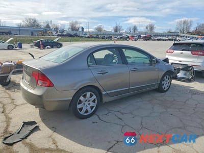 Trzecie zdjęcie samochodu z tyłu: 2006 HONDA CIVIC LX VIN:1HGFA165X6L027151 - miniatura
