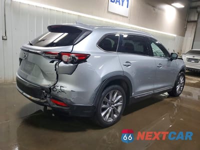 Trzecie zdjęcie samochodu z tyłu: 2021 MAZDA CX-9 GRAND TOURING VIN:JM3TCADY9M0512315 - miniatura