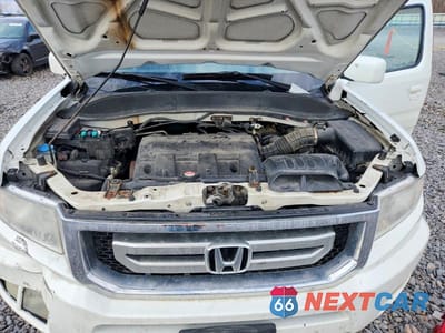Zdjęcie 11 z 12 samochodu: 2009 HONDA RIDGELINE RTL VIN:5FPYK16559B108027 - miniatura