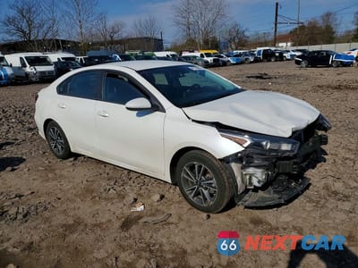 Czwarte zdjęcie samochodu z boku: 2022 KIA FORTE LXS VIN:3KPF24AD2NE462619 - miniatura