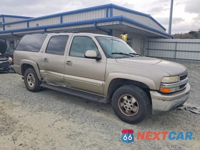 Czwarte zdjęcie samochodu z boku: 2001 CHEVROLET SUBURBAN K1500 VIN:1GNFK16T71J228141 - miniatura