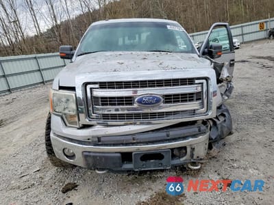 Piąte zdjęcie samochodu w środku: 2013 FORD F150 SUPERCREW VIN:1FTFW1EF5DFD24995 - miniatura