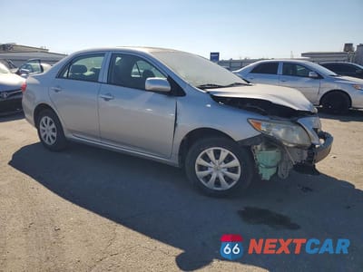 Czwarte zdjęcie samochodu z boku: 2010 TOYOTA COROLLA LE VIN:1NXBU4EE6AZ216885 - miniatura