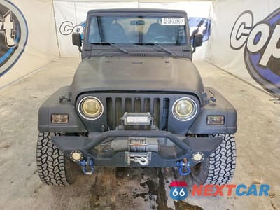 Piąte zdjęcie samochodu w środku: 2000 JEEP WRANGLER / TJ SAHARA VIN:1J4FA59SXYP782863 - miniatura