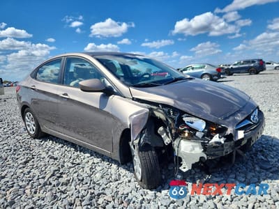 Czwarte zdjęcie samochodu z boku: 2014 HYUNDAI ACCENT GLS VIN:KMHCT4AE4EU669891 - miniatura