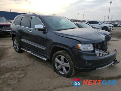 Czwarte zdjęcie samochodu z boku: 2013 JEEP GRAND CHEROKEE OVERLAND VIN:1C4RJFCG5DC542490 - miniatura