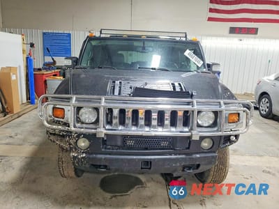 Piąte zdjęcie samochodu w środku: 2005 HUMMER H2 VIN:5GRGN23U75H107869 - miniatura