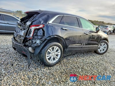 Trzecie zdjęcie samochodu z tyłu: 2022 CADILLAC XT5 LUXURY VIN:1GYKNAR48NZ123161 - miniatura