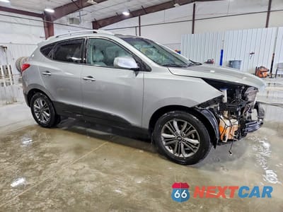 Czwarte zdjęcie samochodu z boku: 2015 HYUNDAI TUCSON SE VIN:KM8JUCAG6FU089124 - miniatura