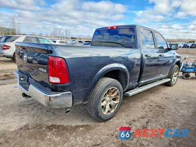 Trzecie zdjęcie samochodu z tyłu: 2014 RAM 1500 SLT VIN:1C6RR7GG2ES319539 - miniatura