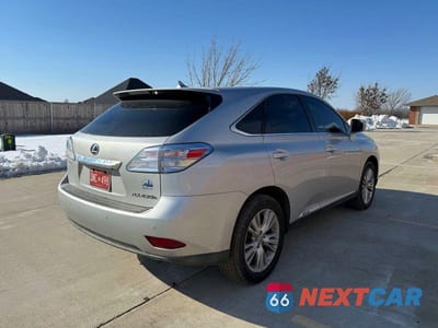 Czwarte zdjęcie samochodu z boku: 2012 LEXUS RX 450H BASE VIN:JTJZB1BA0C2407741 - miniatura